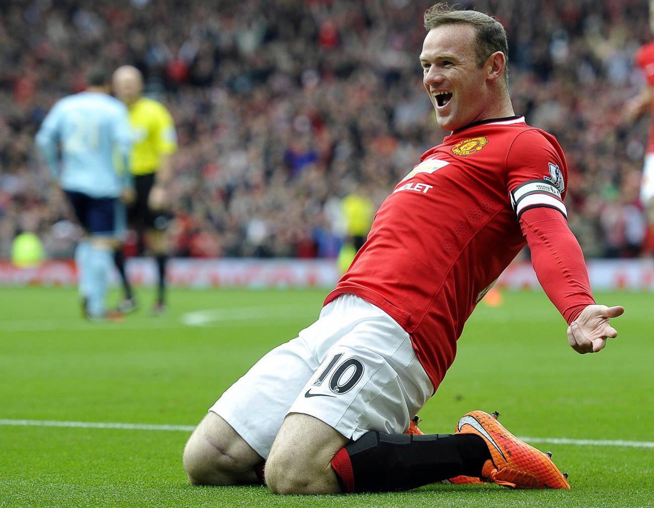 Wayne Rooney, a Manchester United játékosaként ünnepli egyik gólját a sok közül Fotó: MTI/EPA/Philip Richards