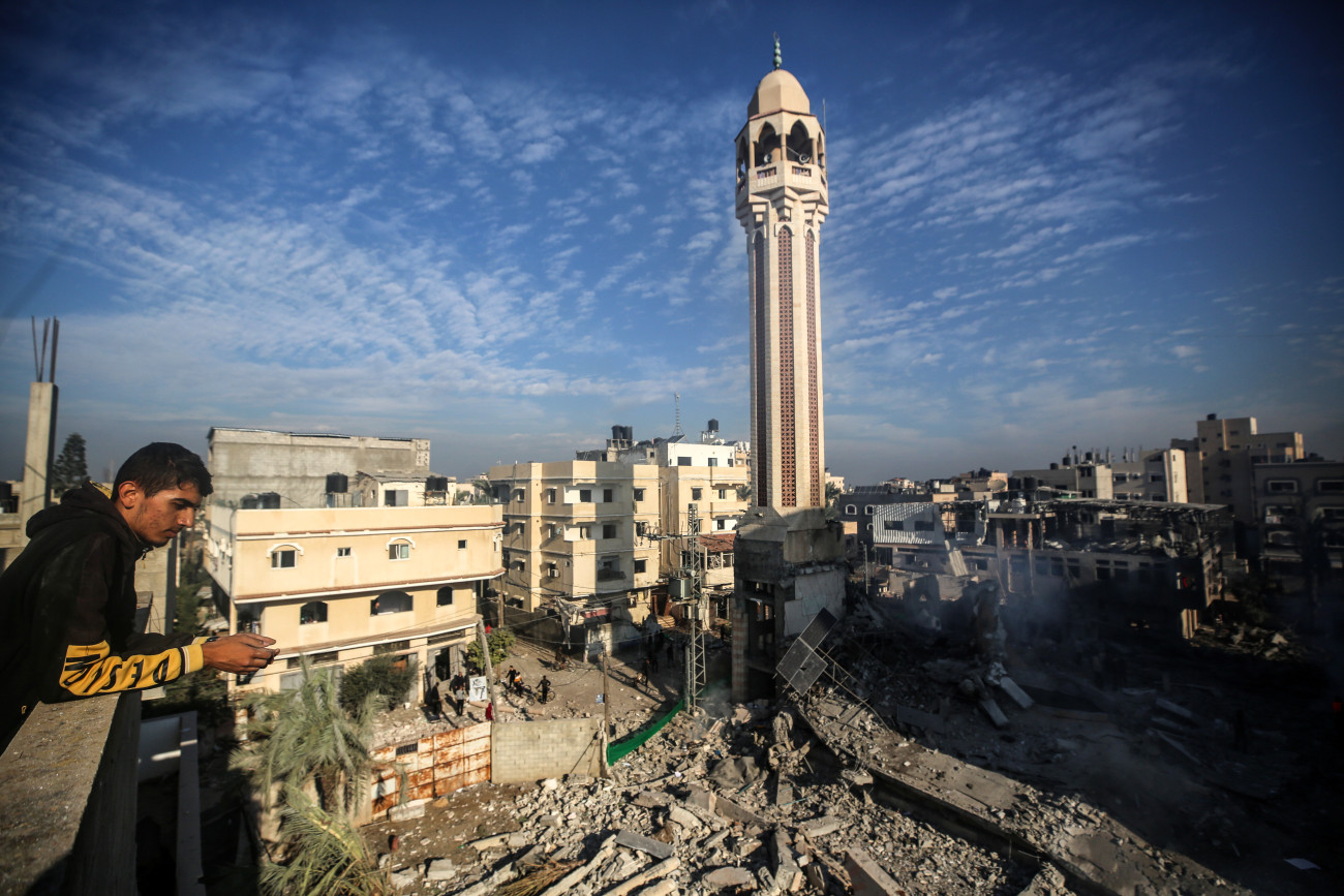 Palestinians are inspecting the debris at the Jaffa Mosque, which was hit by an Israeli bombardment, in Deir el-Balah, in the central Gaza Strip, on December 8, 2023, amid continuing battles between Israel and Hamas. (Photo by Majdi Fathi/NurPhoto via Getty Images)