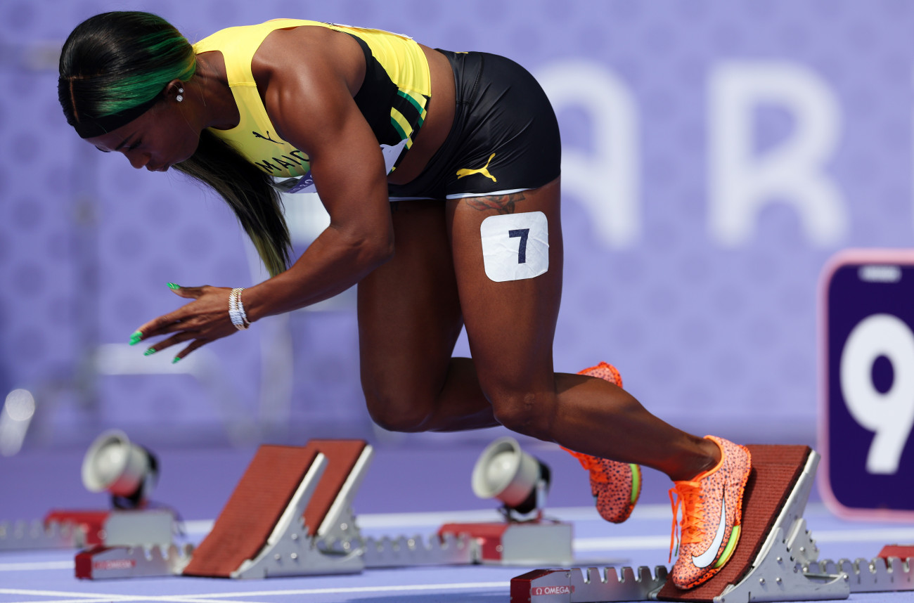PARIS, FRANCE - AUGUST 02: Shelly-Ann Fraser-Pryce of Team Jamaica warms up during the Women's 100m Round 1 Heat 6 on day seven of the Olympic Games Paris 2024 at Stade de France on August 02, 2024 in Paris, France. (Photo by Michael Steele/Getty Images)