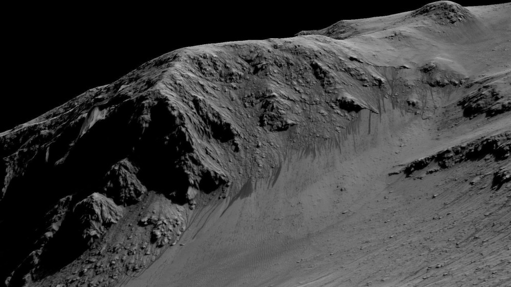 Világűr, 2015. szeptember 28.Az amerikai Országos Repülésügyi és Űrkutatási Hivatal, a NASA által 2015. szeptember 28-án közreadott kép a Mars Horowitz nevű kráterének oldaláról. A képen látható sötét, keskeny, mintegy 100 méter hosszú csíkokról a tudósok azt feltételezik, hogy azokat folyékony sós víz lefolyása okozta a lejtős részeken nyári időszakban.  (MTI/EPA/NASA)