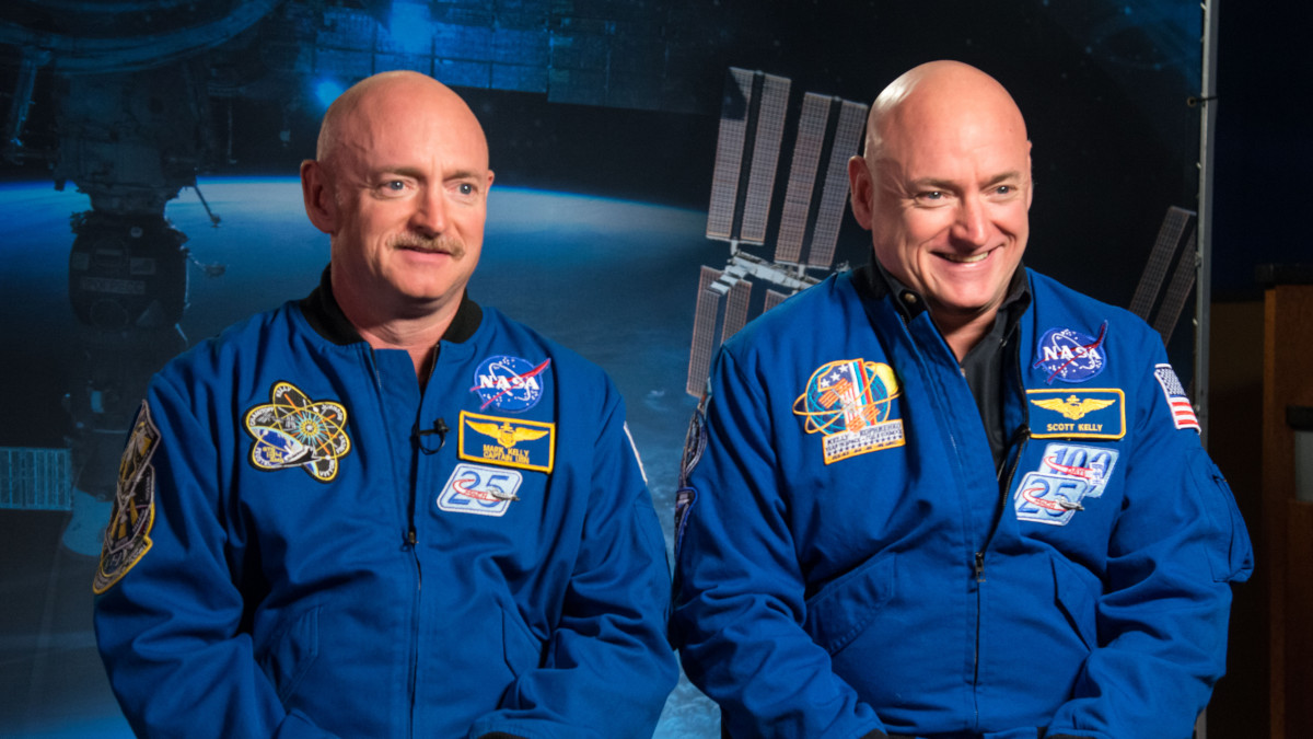 Expedition 45/46 Commander, Astronaut Scott Kelly along with his brother, former Astronaut Mark Kelly speak to news media outlets about Scott Kellys 1-year mission aboard the International Space Station.  Photo Date: January 19, 2015.  Location: Building 2.  Photographer: Robert Markowitz
