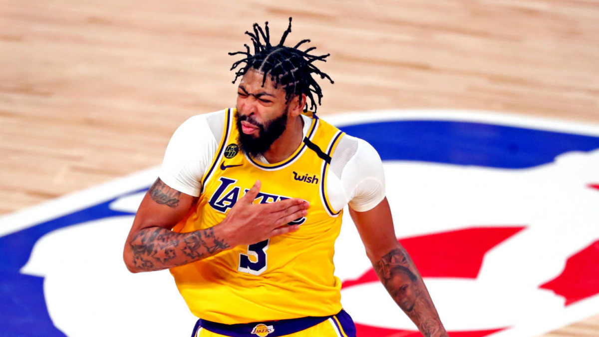 Oct 6, 2020; Miami, Florida, USA; Los Angeles Lakers forward Anthony Davis (3) celebrates after making a three pointer during the fourth quarter against the Miami Heat in game 4 of the 2020 NBA Finals at AdventHealth Arena. Mandatory Credit: Kim Klement-USA TODAY Sports