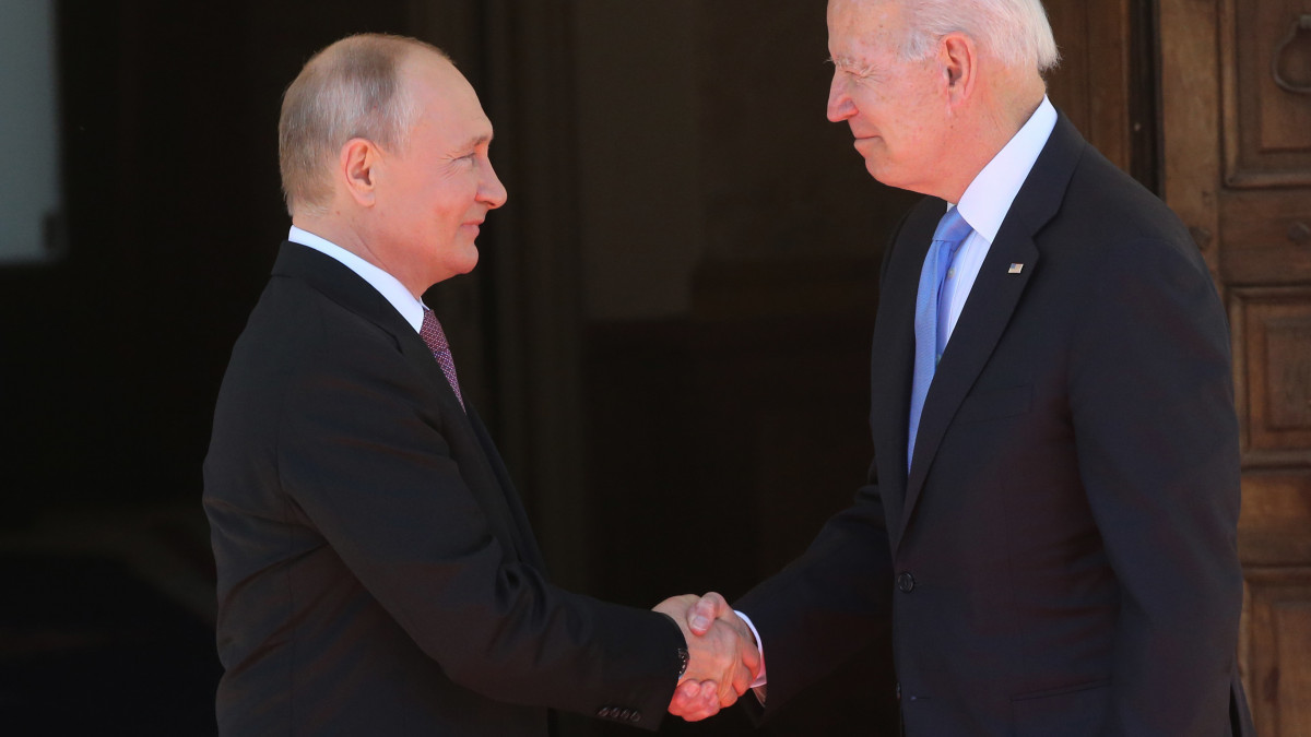 GENEVA, SWITZERLAND - JUNE 16:  (RUSSIA OUT)  Russian President Vladimir Putin (L) greets US President Joe Biden (R) during the US - Russia Summit 2021 at the La Grange Villa near the Geneva Lake, on June 16, 2021 in Geneva, Switzerland. U.S.President Joe Biden is meeting Russian President Putin in Geneva for the first time as presidents, on Wednesday. (Photo by Mikhail Svetlov/Getty Images)