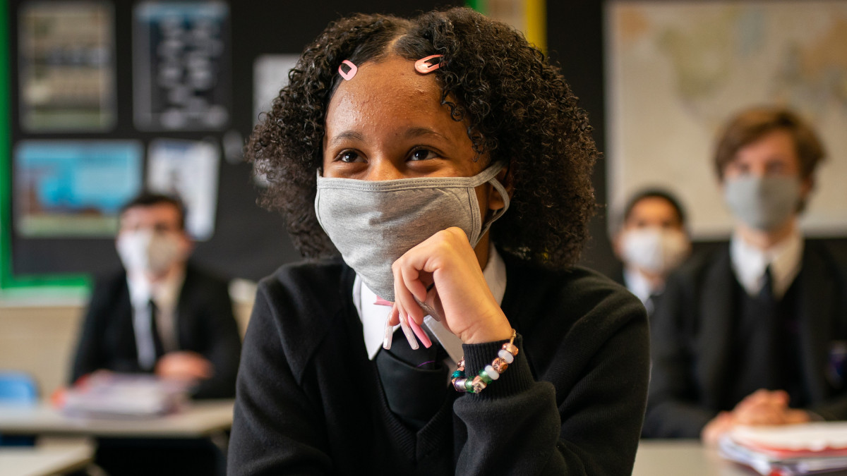 A Year 11 student wearing a facemask in the classroom at Oasis Academy Shirley Park in Croydon, south London, as pupils in England return to school for the first time in two months as part of the first stage of lockdown easing. Picture date: Monday March 8, 2021. (Photo by Aaron Chown/PA Images via Getty Images)