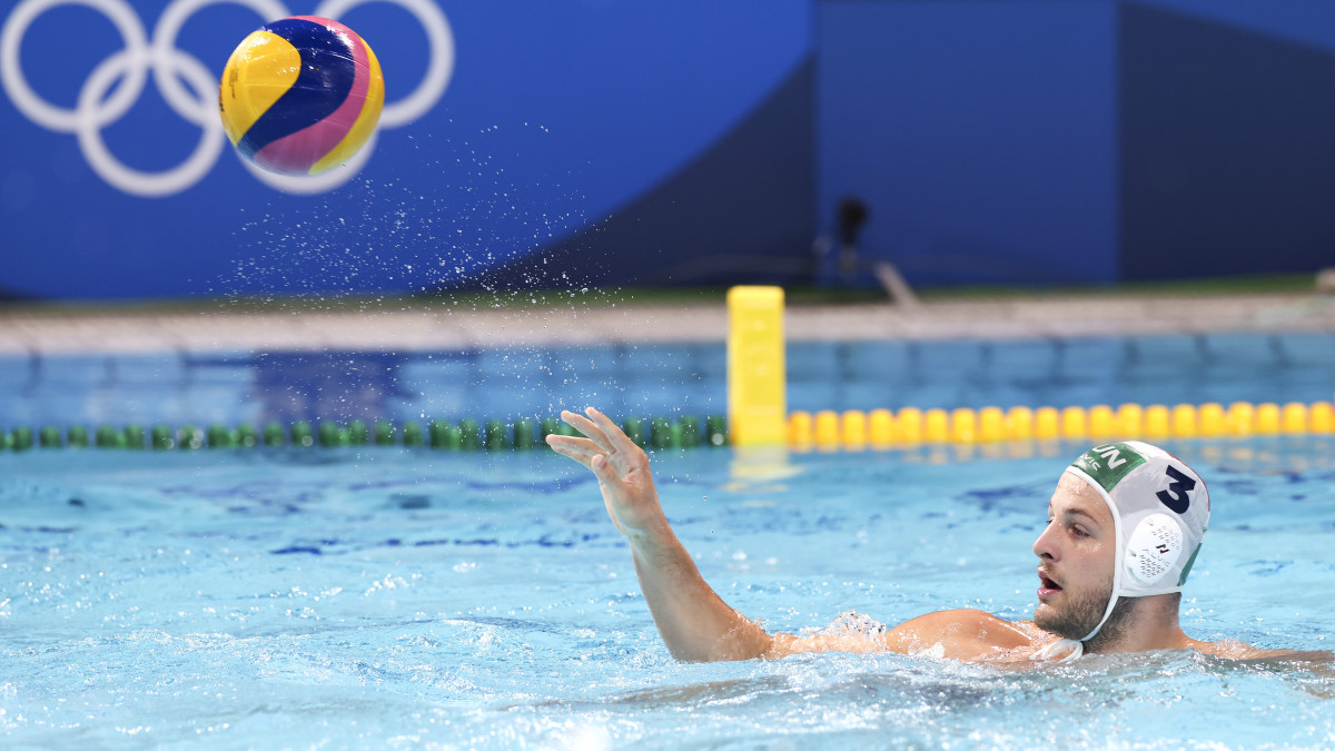 TOKYO, JAPAN - JULY 25: Krisztian Manhercz of Team Hungary passes during the Mens Preliminary Round Group A match between Hungary and Greece on day two of the Tokyo 2020 Olympic Games at Tatsumi Water Polo Centre on July 25, 2021 in Tokyo, Japan. (Photo by Leon Neal/Getty Images)