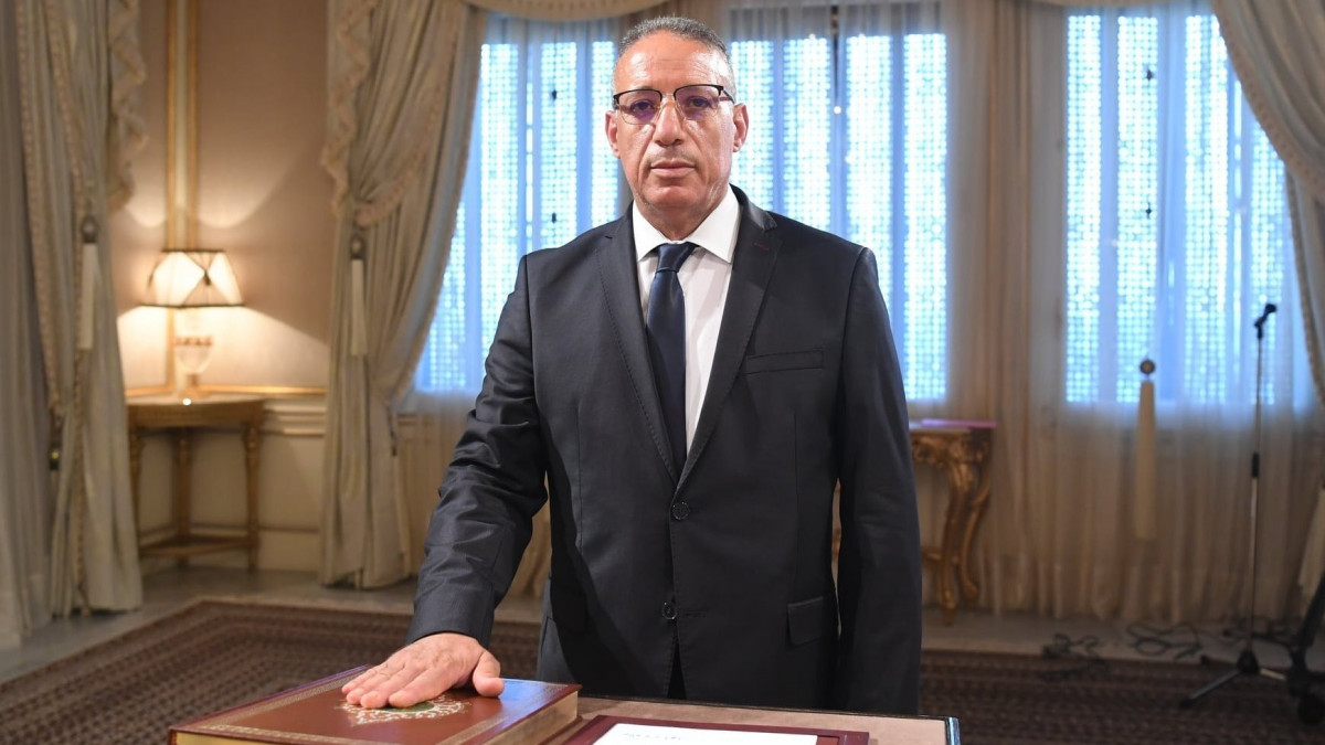 TUNIS, TUNUSIA - JULY 29: (----EDITORIAL USE ONLY MANDATORY CREDIT - TUNISIAN PRESIDENCY / HANDOUT - NO MARKETING NO ADVERTISING CAMPAIGNS - DISTRIBUTED AS A SERVICE TO CLIENTS----) Newly appointed Tunisian Interior Minister Reza Garsillavi takes oath at the Carthage Palace in Tunis, Tunisia on July 29, 2021. (Photo by Tunisian Presidency / Handout/Anadolu Agency via Getty Images)