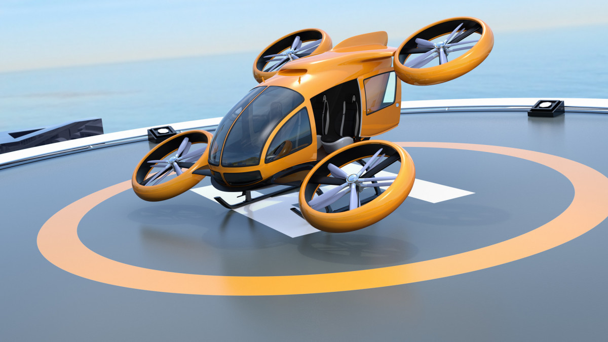 Orange self-driving passenger drone takeoff from helipad. 3D rendering image.