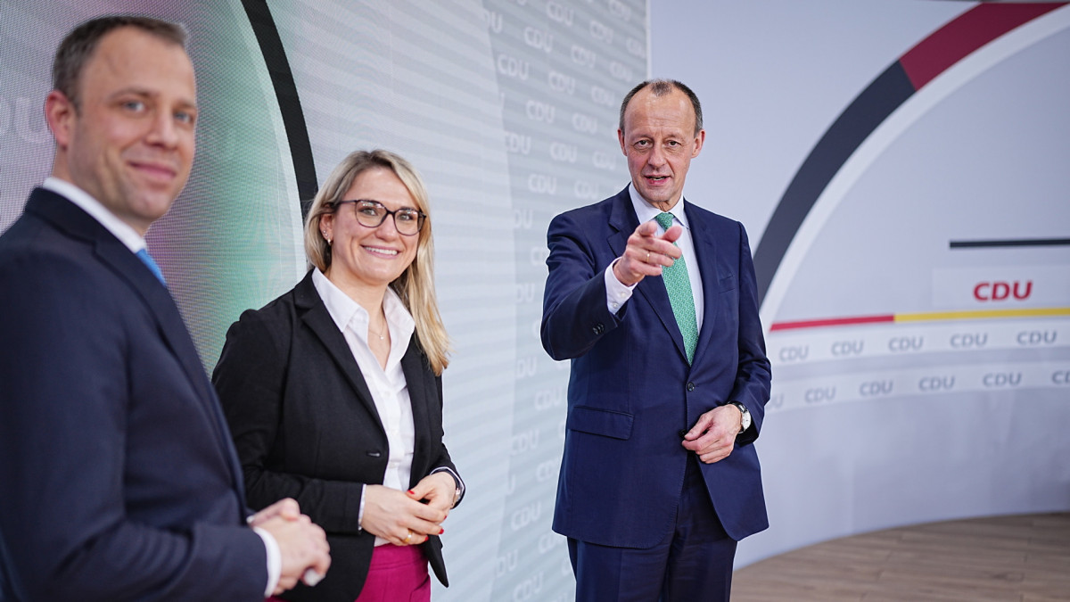22 January 2022, Berlin: Friedrich Merz (r), future CDU federal chairman, stands next to Mario Czaja, future CDU secretary-general, and Christina Stumpp, future CDU deputy secretary-general, after the CDU federal party conference at Konrad Adenauer Haus. At the 34th CDU party congress, Merz was elected as the new federal chairman. Due to the pandemic, the party congress will be held purely digitally. The results of the elections therefore still have to be confirmed by postal vote. Photo: Michael Kappeler/dpa (Photo by Michael Kappeler/picture alliance via Getty Images)