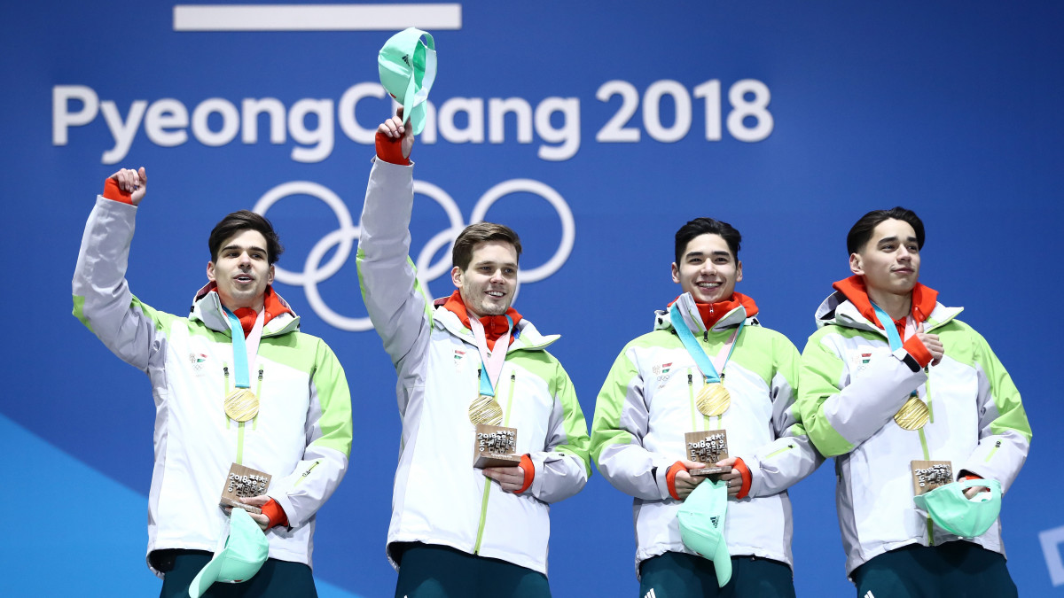 PYEONGCHANG-GUN, SOUTH KOREA - FEBRUARY 23:  Gold medalists Shaoang Liu, Shaolin Sandor Liu, Viktor Knoch and Csaba Burjan of Hungary celebrate during the medal ceremony for Short Track Speed Skating - Mens 5,000m Relay on day 14 of the PyeongChang 2018 Winter Olympic Games at Medal Plaza on February 23, 2018 in Pyeongchang-gun, South Korea.  (Photo by Lars Baron/Getty Images)