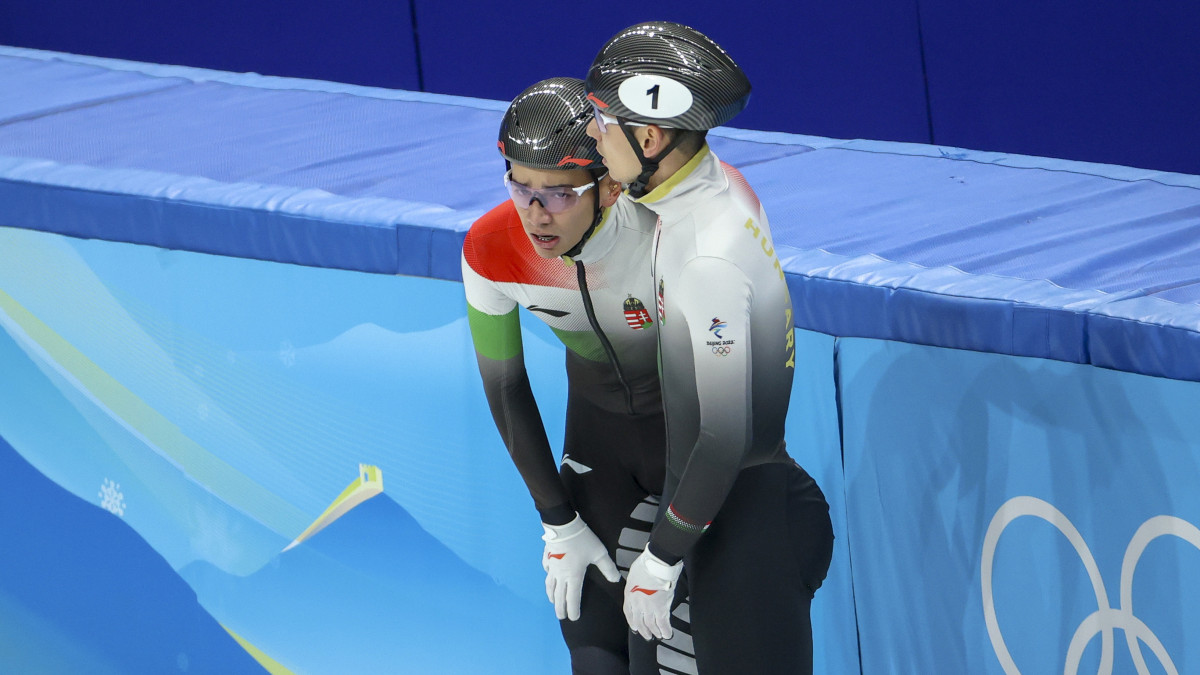 BEIJING, CHINA - FEBRUARY 07: Shaolin Sandor Liu of Team Hungary and Shaoang Liu of Team Hungary react after the Mens 1000m Final A on day three of the Beijing 2022 Winter Olympic Games at Capital Indoor Stadium on February 07, 2022 in Beijing, China. (Photo by Jean Catuffe/Getty Images)