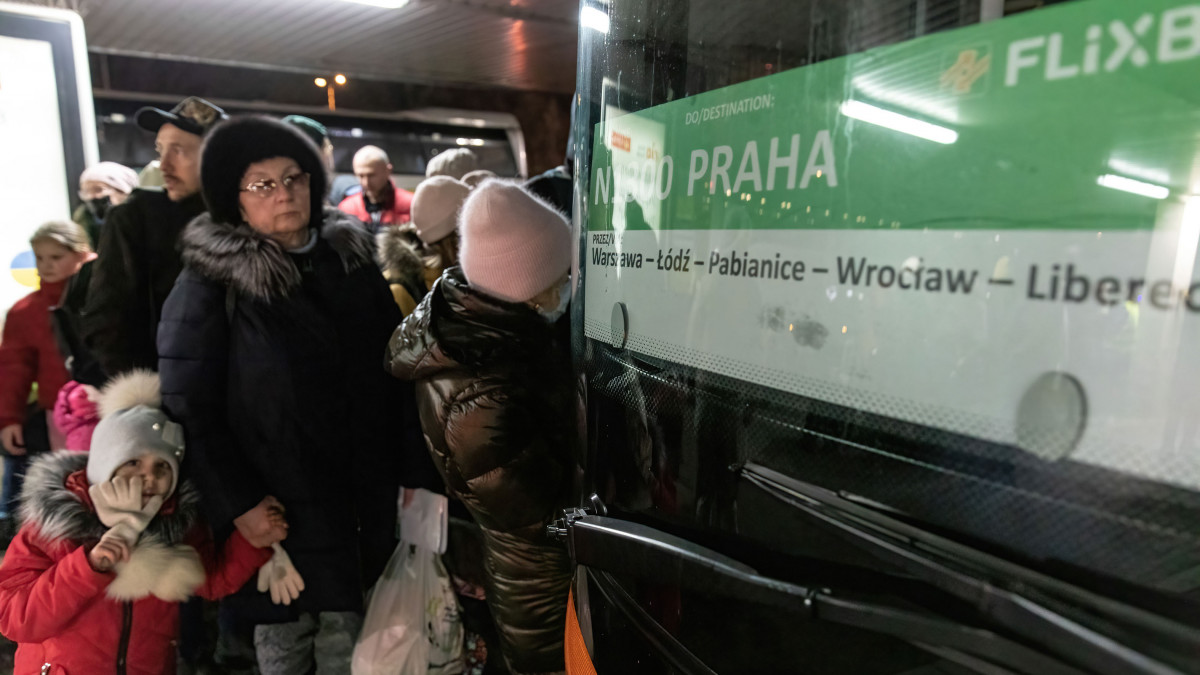 WARSAW, POLAND - 2022/03/08: Ukrainian refugees lining up for buses departing to Liberec, Czech Republic in Warszawa Zachodnia station.As war crisis in Ukraine continues, millions of Ukrainians have been fled from their homeland to Poland, most of them are women and children. Most of them temporarily resting in railway stations in Warsaw and awaiting resettlement, According to UN agency, the numbers of refugee migration have hit 1.5 million, which is the fastest-ever since the Second World War. The Polish government has announced a plan of 8 billion zloty ($1.7 billion) to aid the refugees. (Photo by Alex Chan Tsz Yuk/SOPA Images/LightRocket via Getty Images)