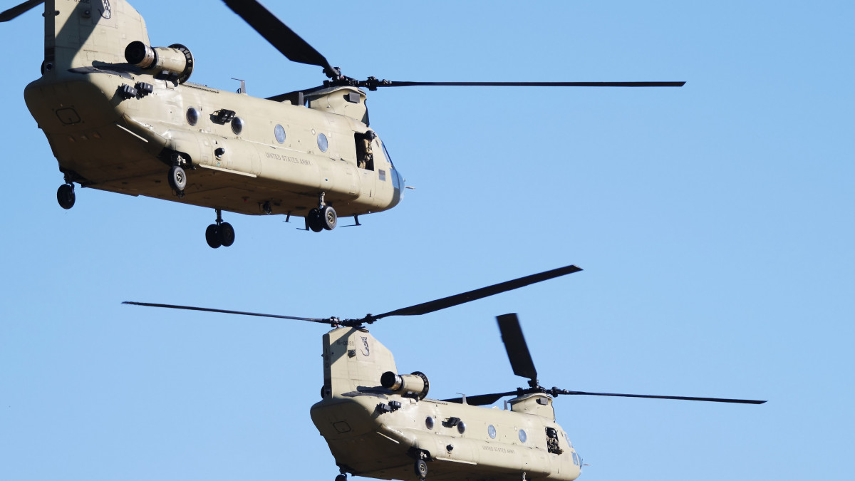 UNSPECIFIED, LITHUANIA - MARCH 01: US army Chinook helicopters landing in field on March 1, 2022 in UNSPECIFIED, Lithuania. Saber Strike 2022 is an element of the large-scale exercise Defender-Europe 2022 military drills between U.S. troops and allied forces. (Photo by Liutauras Strimaitis/Epsilon/Getty Images)