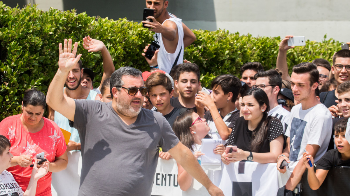 Carmine &quot;Mino&quot; Raiola,  football agent representing the new player of Juventus Matthijs de Ligt,  greets the fans in front of the J-Medical during her  the medical checks, Turin Italy. (Photo by Mauro Ujetto/NurPhoto via Getty Images)