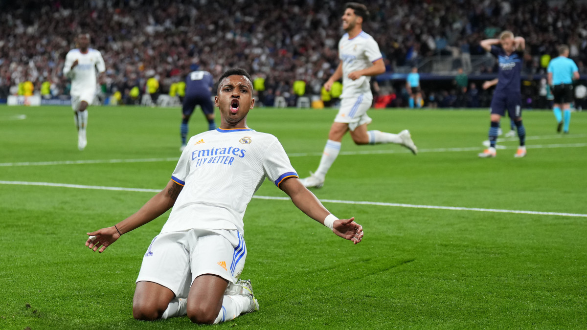 MADRID, SPAIN - MAY 04: Rodrygo of Real Madrid celebrates after scoring their sides second goal during the UEFA Champions League Semi Final Leg Two match between Real Madrid and Manchester City at Estadio Santiago Bernabeu on May 04, 2022 in Madrid, Spain. (Photo by Angel Martinez/Getty Images)