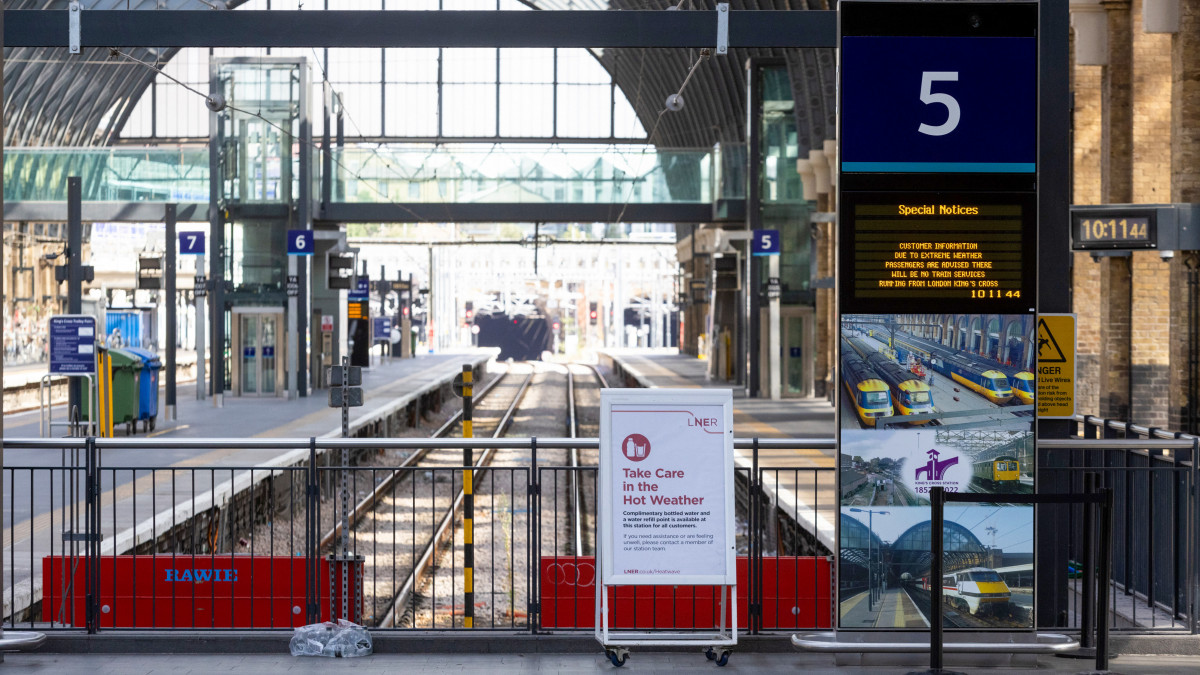 A sign offering complimentary bottled water in the hot weather, during a heat wave, at London Kings Cross railway station in London, U.K., on Tuesday, July 19, 2022. Temperatures in the UK hit a record Tuesday as the heat wave disrupts travel, business and schools, and poses a risk to lives across the country. Photographer: Chris Ratcliffe/Bloomberg via Getty Images