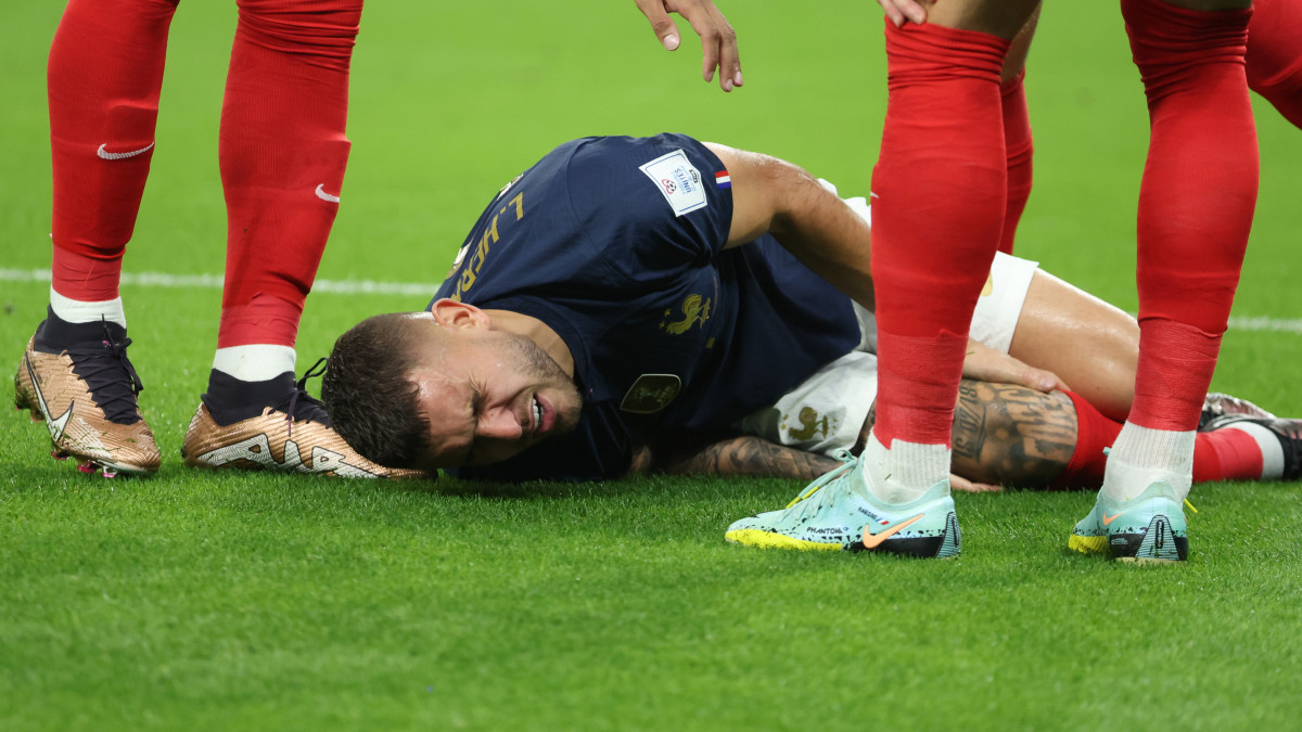 AL WAKRAH, QATAR - NOVEMBER 22:  Lucas Hernandez of France is injured early in the match and has to be substituted during the FIFA World Cup Qatar 2022 Group D match between France and Australia at Al Janoub Stadium on November 22, 2022 in Al Wakrah, Qatar. (Photo by Jean Catuffe/Getty Images)