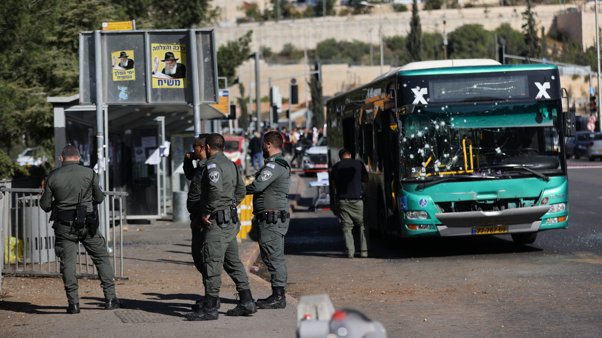 JERUSALEM - NOVEMBER 23: Security forces inspect the area after two separate explosions that took place near the bus stop and at least 14 people were injured in West Jerusalem on November 23, 2022. The police suspect that the perpetrator arrived on an electric bike and placed the explosive device. (Photo by Mostafa Alkharouf/Anadolu Agency via Getty Images)