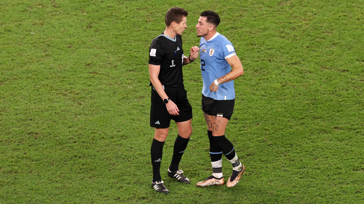 AL WAKRAH, QATAR - DECEMBER 02: Jose Maria Gimenez of Uruguay protests to Referee Daniel Siebert during the FIFA World Cup Qatar 2022 Group H match between Ghana and Uruguay at Al Janoub Stadium on December 02, 2022 in Al Wakrah, Qatar. (Photo by Ryan Pierse/Getty Images)