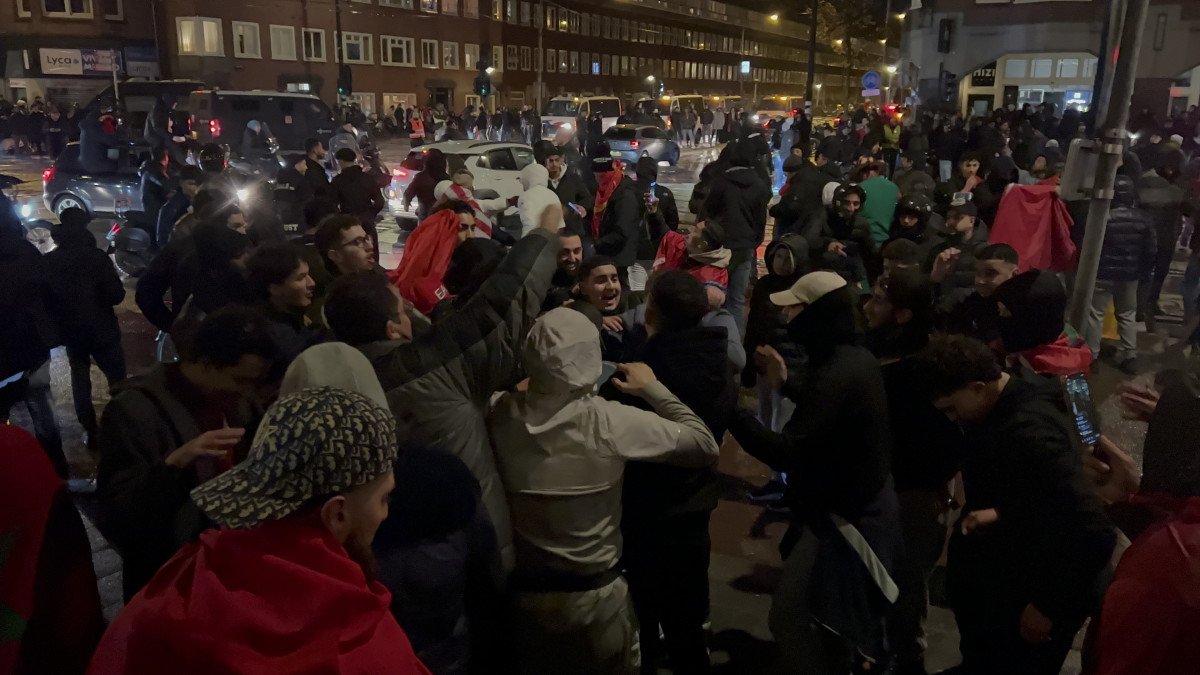 AMSTERDAM, NETHERLANDS - DECEMBER 06: Moroccan supporters celebrate victory as Morocco qualified for 2022 FIFA World Cup quarterfinals after beating Spain on penalties during the FIFA World Cup Qatar 2022 Round of 16 match between Morocco and Spain at Mercator Square in Amsterdam, Netherlands on December 06, 2022. (Photo by Selman Aksunger/Anadolu Agency via Getty Images)