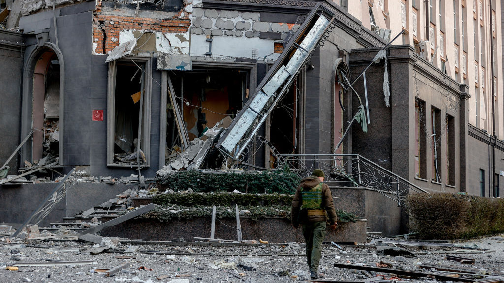 KYIV, UKRAINE - DECEMBER 31: Ukrainian security forces investigate at scene after rockets fired by Russian forces hit the centre of Ukrainian capital Kyiv on December 31, 2022. (Photo by Mustafa Ciftci/Anadolu Agency via Getty Images)