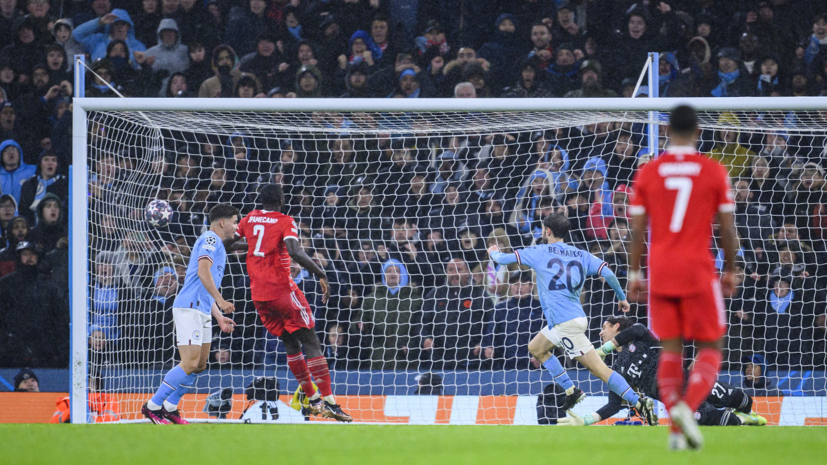 11 April 2023, Great Britain, Manchester: Soccer: Champions League, Manchester City - Bayern Munich, knockout round, quarterfinals, first leg, Etihad Stadium. Manchesters Bernardo Silva (2nd from right) scores the goal for 2:0. Photo: Tom Weller/dpa (Photo by Tom Weller/picture alliance via Getty Images)