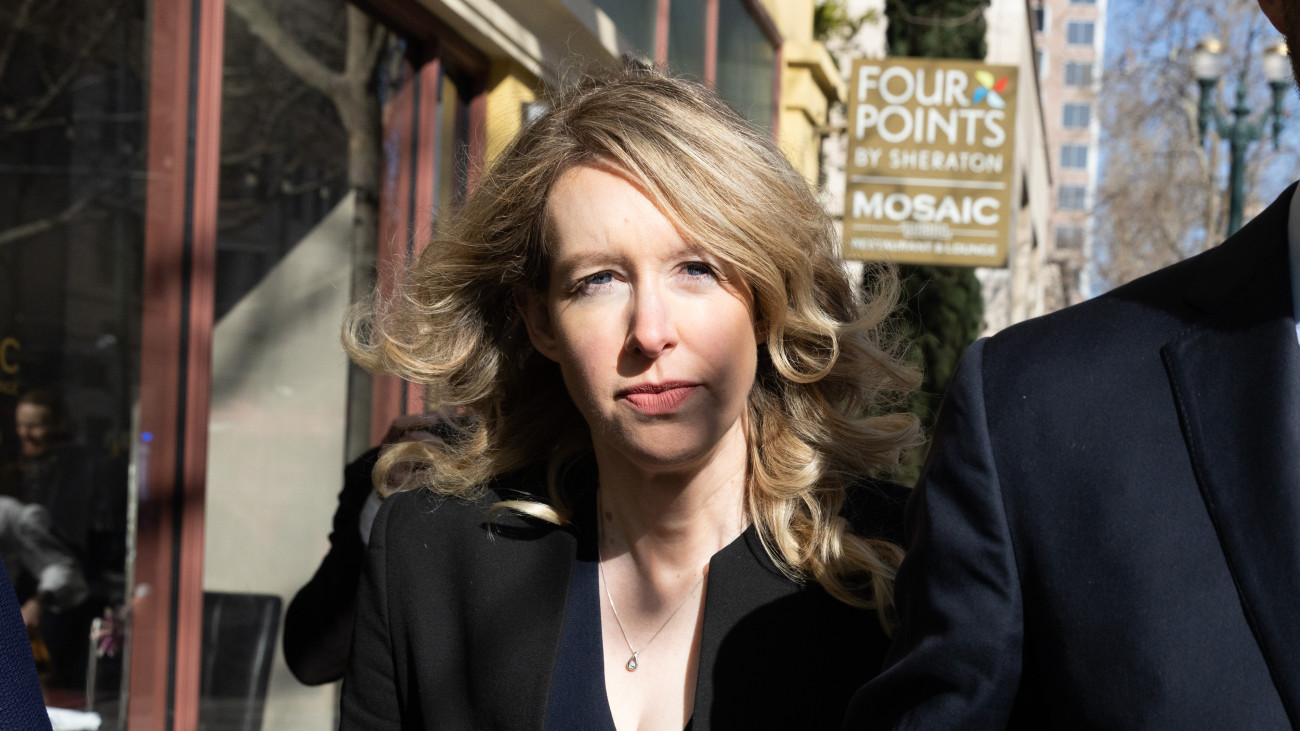 Elizabeth Holmes, founder of Theranos Inc., arrives at federal court in San Jose, California, US, on Friday, March 17, 2023. Holmes made her final appearance before the federal judge who sentenced her to 11 1/4 years in prison for defrauding Theranos investors. Shes scheduled to report to prison next month, but is asking to remain free on bail while she appeals her conviction and sentence. Photographer: Benjamin Fanjoy/Bloomberg via Getty Images