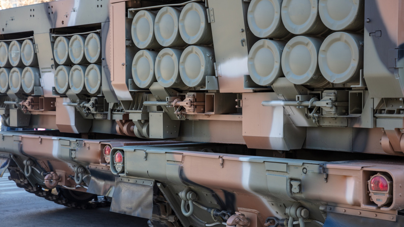 MLRS Multiple Launch Rocket System. Military parade. Army heavy vehicle for war and defense, close up view