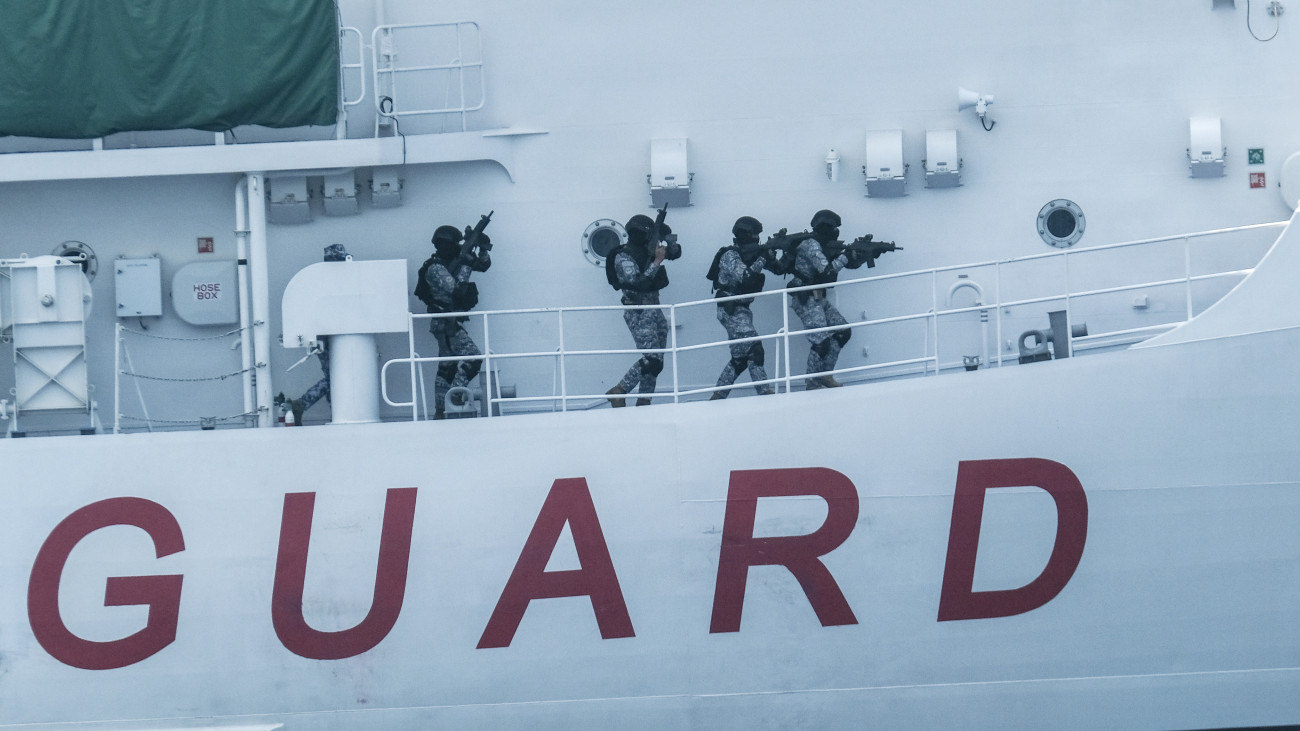 Members of the Philippine Coast Guard take part in a simulation during a joint maritime exercise with Coast Guards from Japan and theÂ US off the coast of Mariveles, Bataan, the Philippines, on Tuesday, June 6, 2023. TheÂ trilateralÂ drills are taking place off Bataan province that faces the South China Sea from June 1 to 7, according to a Philippine Coast Guard statement, and the exercises include maritime law enforcement training and maneuvering drills, it said. Photographer: Veejay Villafranca/Bloomberg via Getty Images