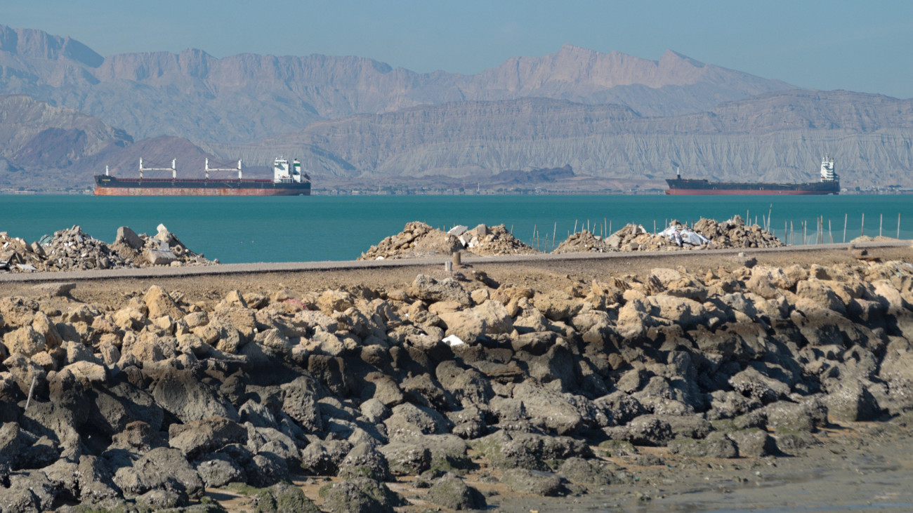 Large cargo and tanker ships at Shahid Rajai port from Qeshm island pier, Persian Gulf, Iran