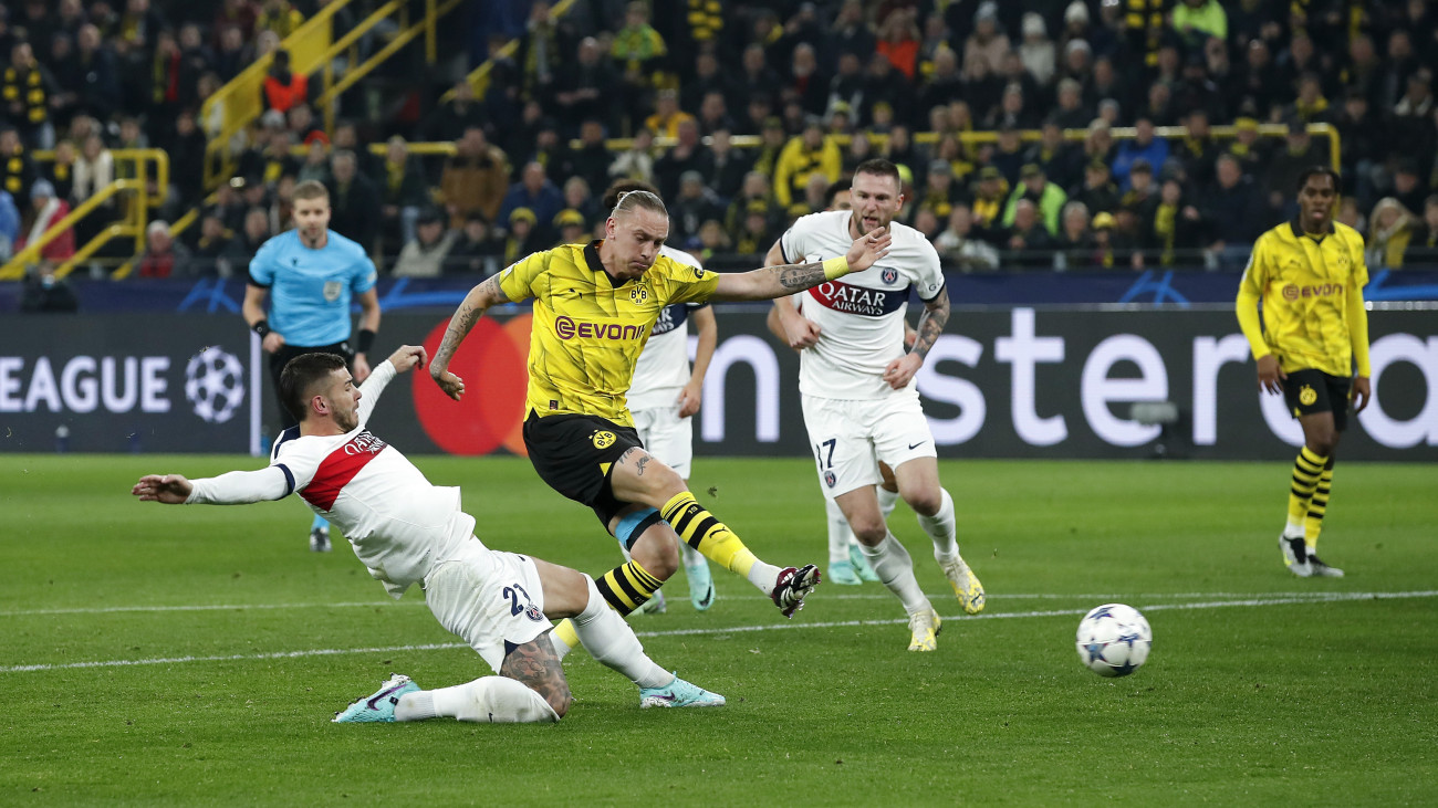 DORTMUND - (l-r) Lucas Hernandez of Paris Saint-Germain, Marius Wolf of Borussia Dortmund, Vitinha of Paris Saint-Germain during the UEFA Champions League Group F match between Borussia Dortmund and Paris Saint-Germain at Signal Iduna Park on December 13 2023 in Dortmund, Germany. ANP | Hollandse Hoogte | Bart Stoutjesdijk (Photo by ANP via Getty Images)