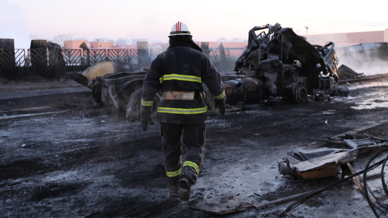 ULAANBAATAR, MOGNOLIA - JANUARY 24: (----EDITORIAL USE ONLY - MANDATORY CREDIT - MONGOLIAN EMERGENCY MINISTRY/ HANDOUT - NO MARKETING NO ADVERTISING CAMPAIGNS - DISTRIBUTED AS A SERVICE TO CLIENTS----) Firefighters work at the scene after a truck carrying 60 tons of liquified natural gas and a car collided at an intersection in Ulaanbaatar, Mongolia on January 24, 2024. According to Mongolian emergency officials, there are causalities reported. (Photo by Mongolian Emergency Ministry/Anadolu via Getty Images)