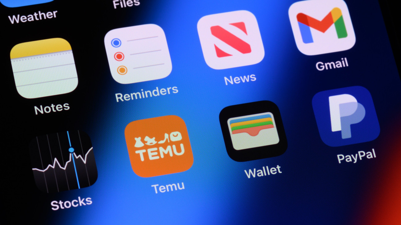 Toronto, Canada - January 20, 2024:  Temu, PayPal and various other apps on an Apple iPhone.