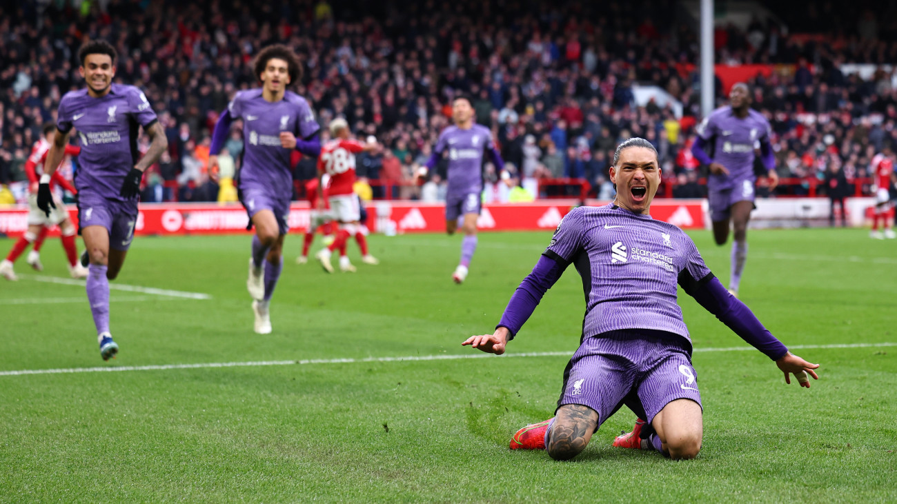 NOTTINGHAM, ENGLAND - MARCH 2: Darwin Nunez of Liverpool celebrates after scoring a goal to make it 0-1 during the Premier League match between Nottingham Forest and Liverpool FC at City Ground on March 2, 2024 in Nottingham, England. (Photo by Robbie Jay Barratt - AMA/Getty Images)