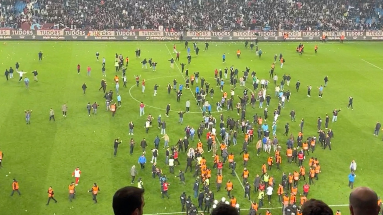 TRABZON, TURKIYE - MARCH 17: An aerial view of supporters entering on the pitch after the Turkish Super Lig week 30 football match between Trabzonspor and Fenerbahce at Papara Park in Trabzon, Turkiye on March 17, 2024. (Photo by Enes Sansar/Anadolu via Getty Images)