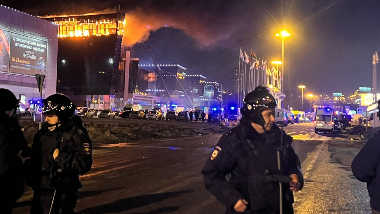 MOSCOW, RUSSIA - MARCH 22: Ambulances, personnel arrive at Crocus City Hall concert venue near Moscow, Russia after reports of a shooting incident on March 22, 2024. It was reported that several gunmen burst into a big concert hall in Moscow and fired weapons at the crowd, Russian Federal Security Service says 40 killed, 100 injured in shooting at Crocus City Hall in Moscow region. (Photo by Ali Cura/Anadolu via Getty Images)