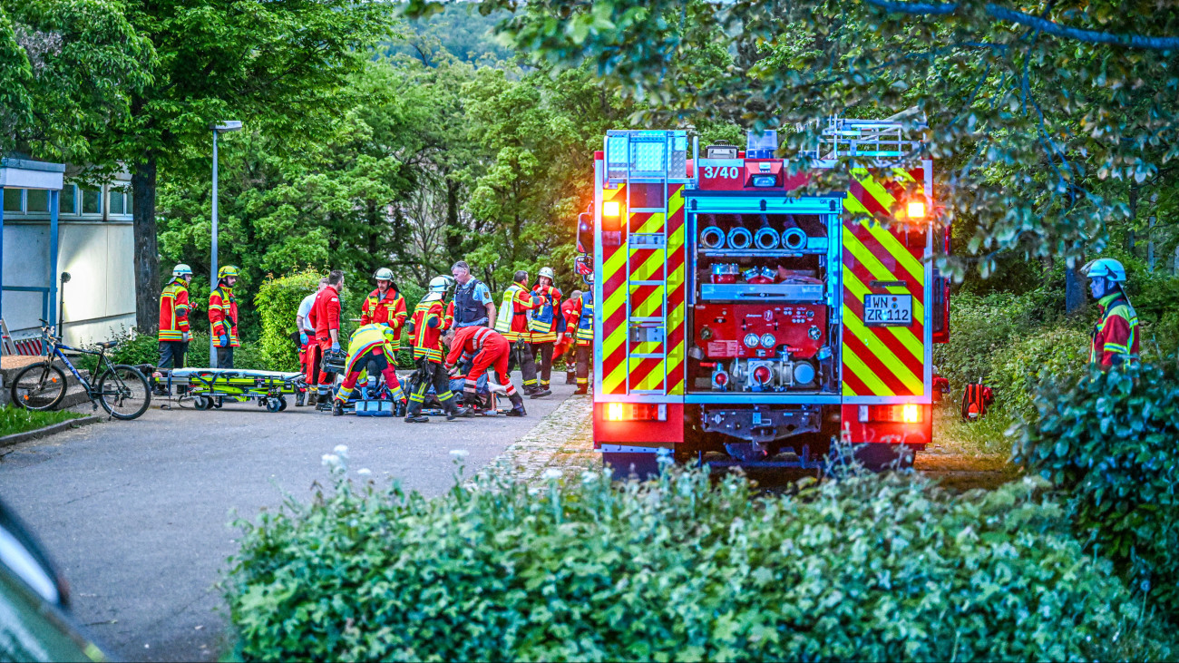 04 May 2024, Baden-WĂźrttemberg, Remshalden: Emergency services are on duty at an old gymnasium. Four children fell through the roof of a sports hall in Remshalden in the Stuttgart region and were seriously injured.  They had probably fallen through the skylight of the roof while playing. Photo: Marius Bulling/dpa (Photo by Marius Bulling/picture alliance via Getty Images)