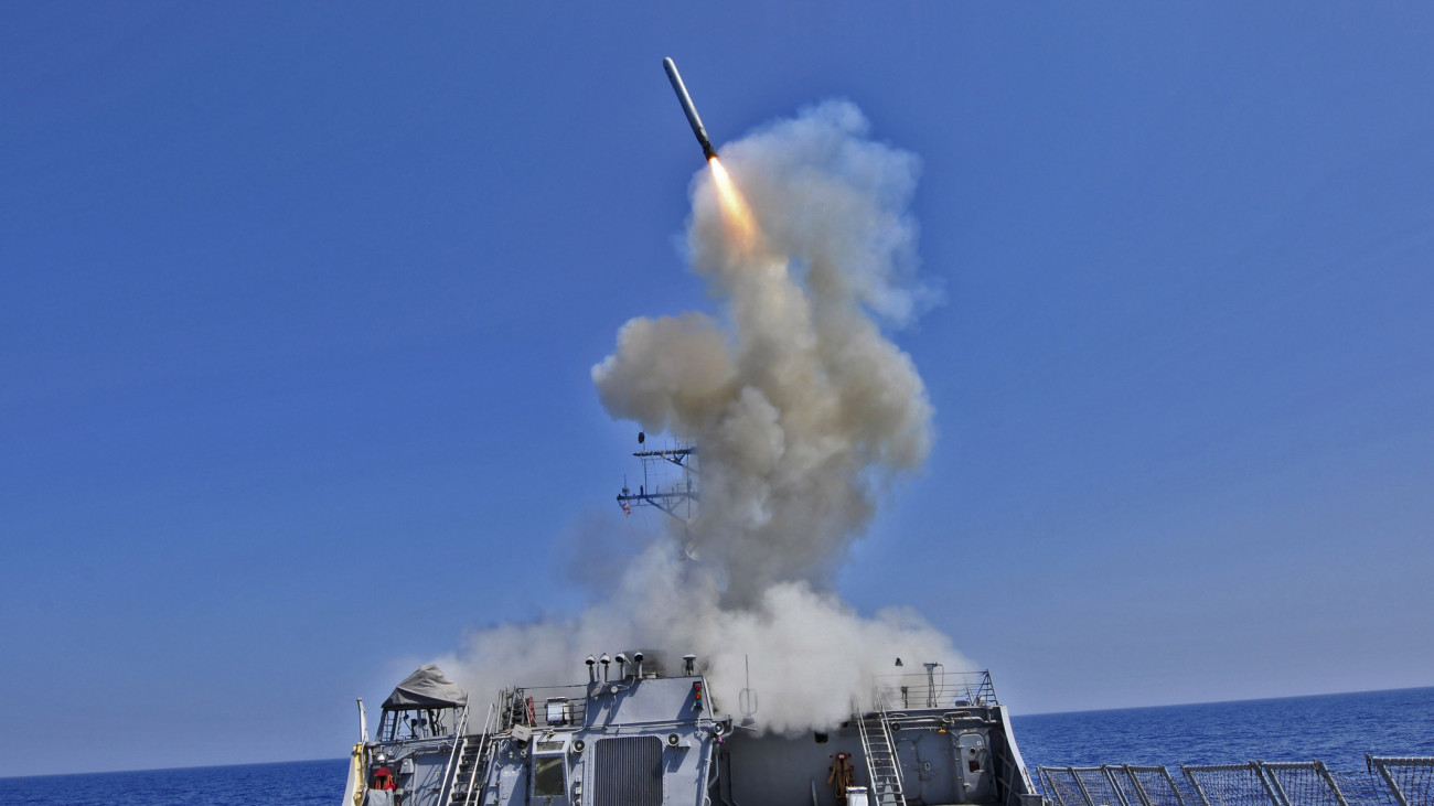 March 29, 2011 - The guided missile destroyer USS Barry (DDG-52) launches a Tomahawk cruise missile from the Mediterranean Sea in support of Operation Odyssey Dawn.