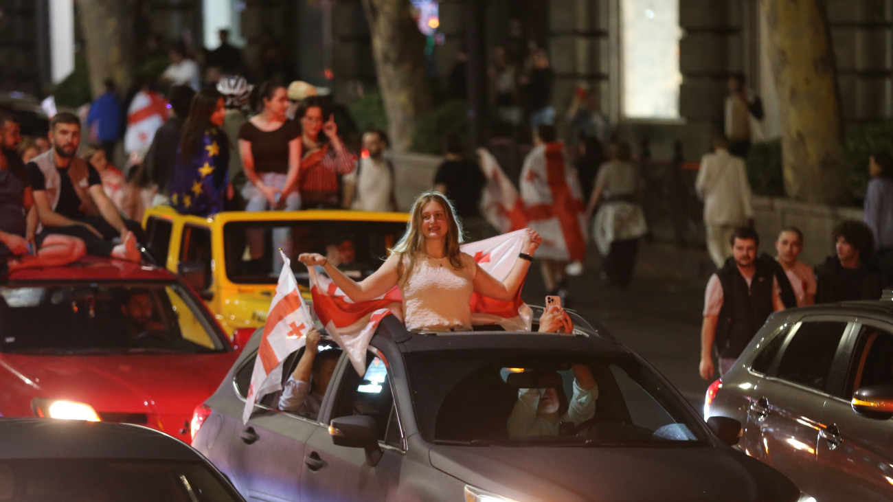 TBILISI, GEORGIA - JUNE 27: Georgians celebrate with car convoys after their team qualified for the last 16 stages following a victory in the UEFA EURO 2024 group stage match against Portugal on June 27, 2024 in Tbilisi, Georgia. (Photo by Davit Kachkachishvili/Anadolu via Getty Images)