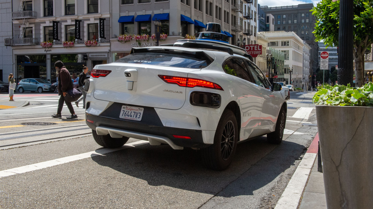 16 May 2024, USA, San Francisco: A driverless robot cab from Googles sister company Waymo is on the road. Photo: Andrej Sokolow/dpa (Photo by Andrej Sokolow/picture alliance via Getty Images)