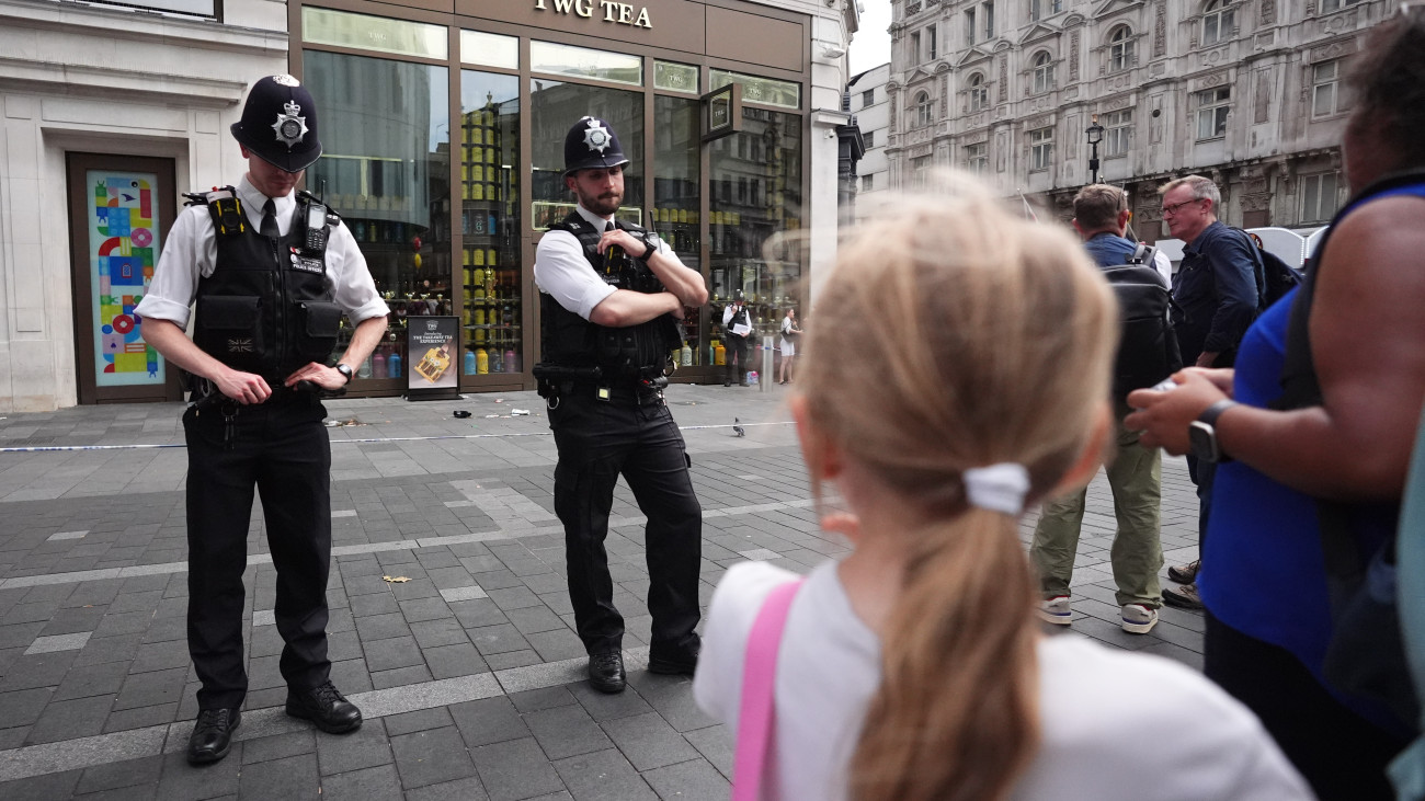 Police officers at the scene in Leicester Square, London, as a man has been arrested after an 11-year-old girl and 34-year-old woman were stabbed. Picture date: Monday August 12, 2024. (Photo by James Manning/PA Images via Getty Images)