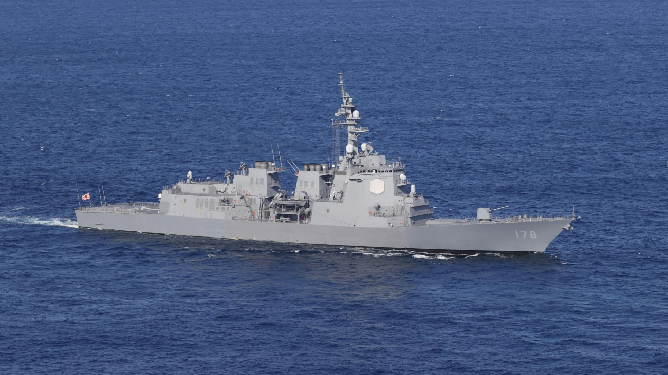 Photo taken by a Kyodo News reporter on board a Japan Maritime Self-Defense Force helicopter shows the MSDF destroyer Ashigara taking part in an international fleet review in Sagami Bay off Kanagawa Prefecture near Tokyo on Nov. 6, 2022.