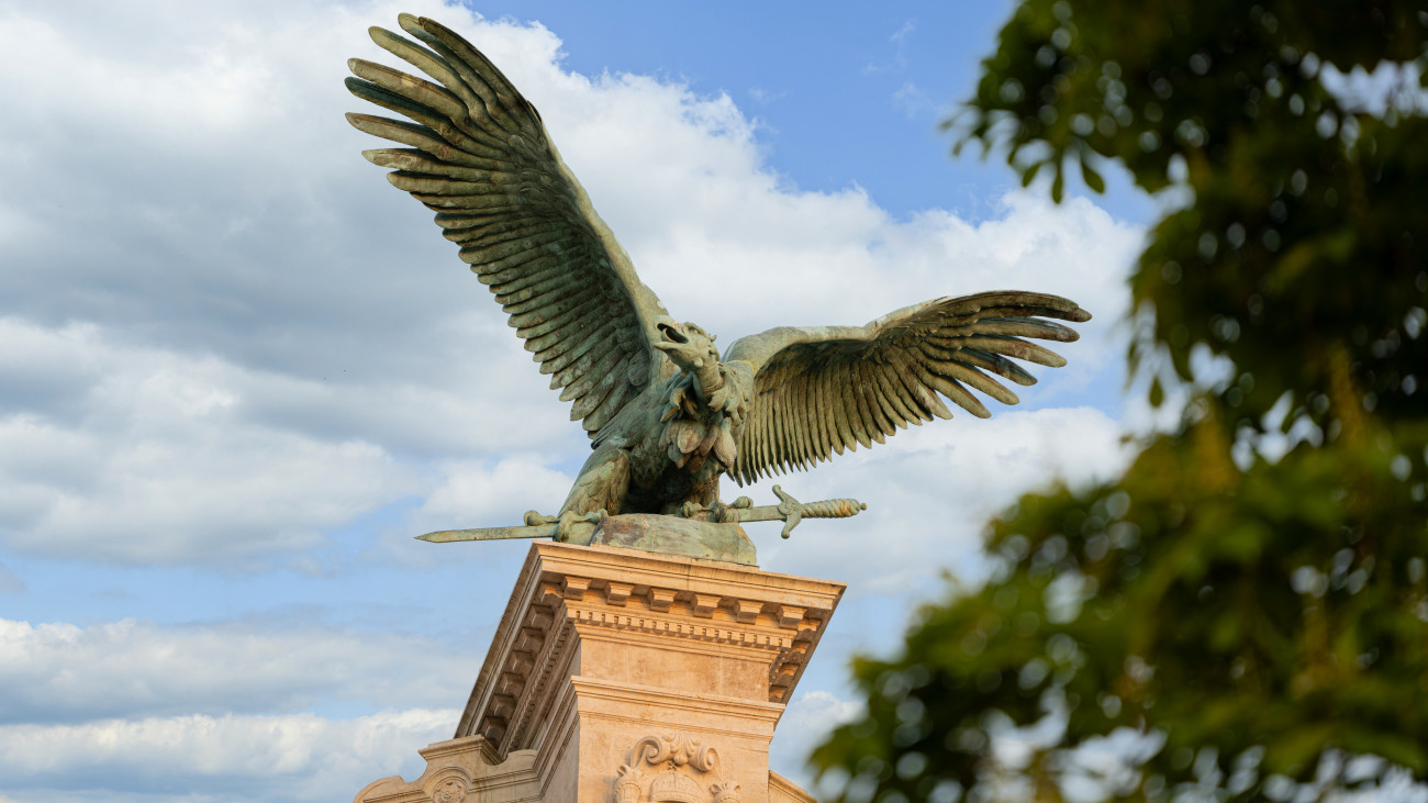 Eagle statue in Buda Palace in Budapest Hungary. Buda Castle exterior ornate by a beautiful eagle statue in Budapest Hungary.