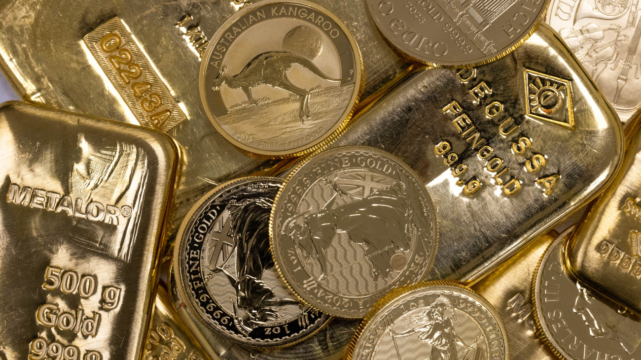 A selection of gold bars and one-ounce gold coins arranged at Gold Investments Ltd. bullion dealers in London, UK, on Tuesday, May 21, 2024. GoldÂ slipped  after hitting an all-time high in the previous session  with investors assessing recent hawkish commentary from Federal Reserve officials that downplayed the possibility of imminent rate cuts.Â Photographer: Chris Ratcliffe/Bloomberg via Getty Images