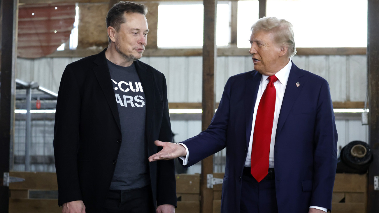 BUTLER, PENNSYLVANIA - OCTOBER 05: Republican presidential nominee, former President Donald Trump offers his hand to Elon Musk back stage during a campaign rally at the Butler Farm Show grounds on October 05, 2024 in Butler, Pennsylvania. This is the first time that Trump has returned to Butler since he was injured during an attempted assassination on July 13.  (Photo by Anna Moneymaker/Getty Images)