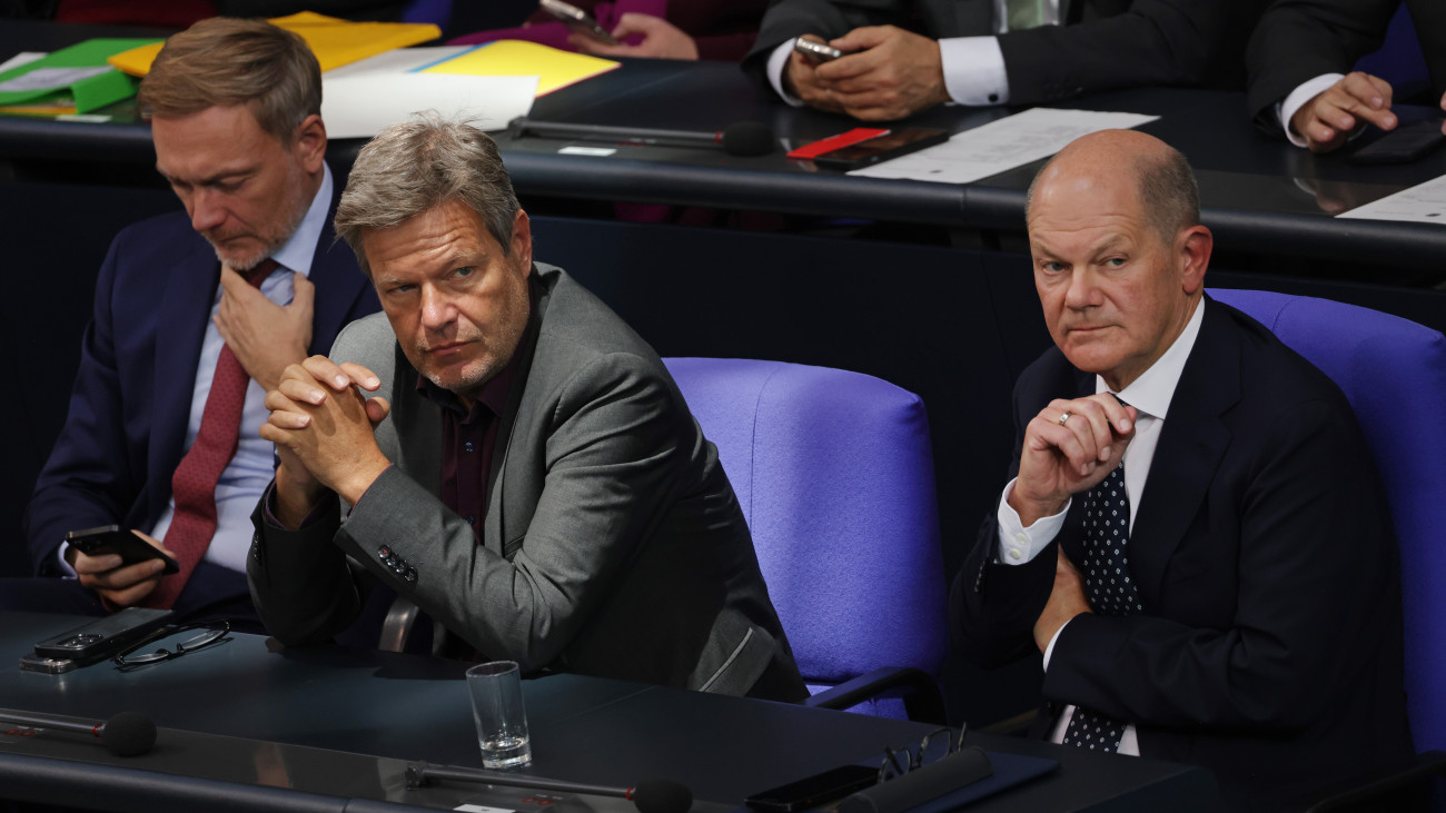 BERLIN, GERMANY - OCTOBER 16: (From L to R) German Finance Minister Christian Lindner, Economy and Climate Action Minister Robert Habeck and Chancellor Olaf Scholz attend debates after Scholz spoke at the Bundestag one day before a planned meeting of the European Council on October 16, 2024 in Berlin, Germany. Curbing irregular migration is among the main topics on the European Council meeting agenda. (Photo by Sean Gallup/Getty Images)