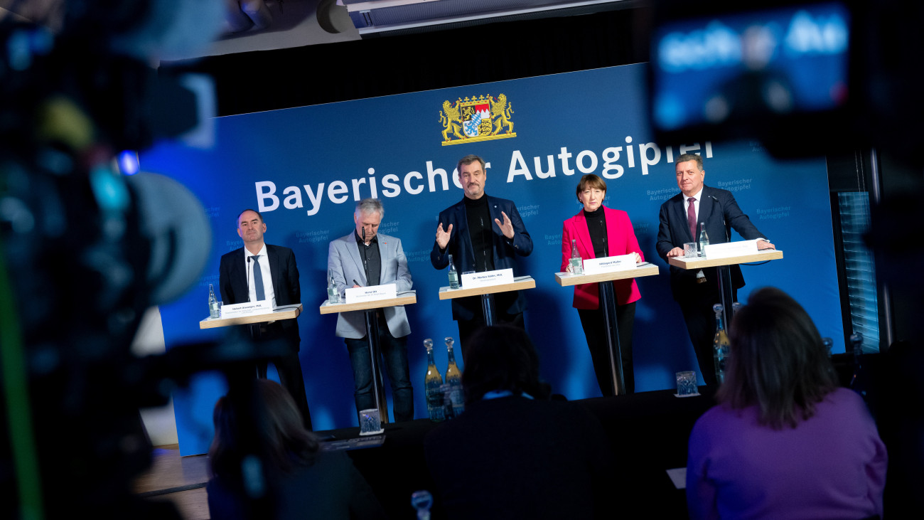 02 December 2024, Bavaria, Munich: Hubert Aiwanger (l-r, Free Voters), Minister of Economic Affairs of Bavaria, Horst Ott, IG Metall District Manager of Bavaria, Markus SĂśder (CSU), Prime Minister of Bavaria, Hildegard MĂźller, President of the German Automobile Association VDA, and Christian Bernreiter (CSU), Construction and Transport Minister of Bavaria, take part in a press conference after an automotive summit. Bavarian Minister President SĂśder (CSU) has invited all key representatives of the industry - employers and employees, trade unions and associations, car manufacturers and suppliers - to an automotive summit. Photo: Sven Hoppe/dpa (Photo by Sven Hoppe/picture alliance via Getty Images)