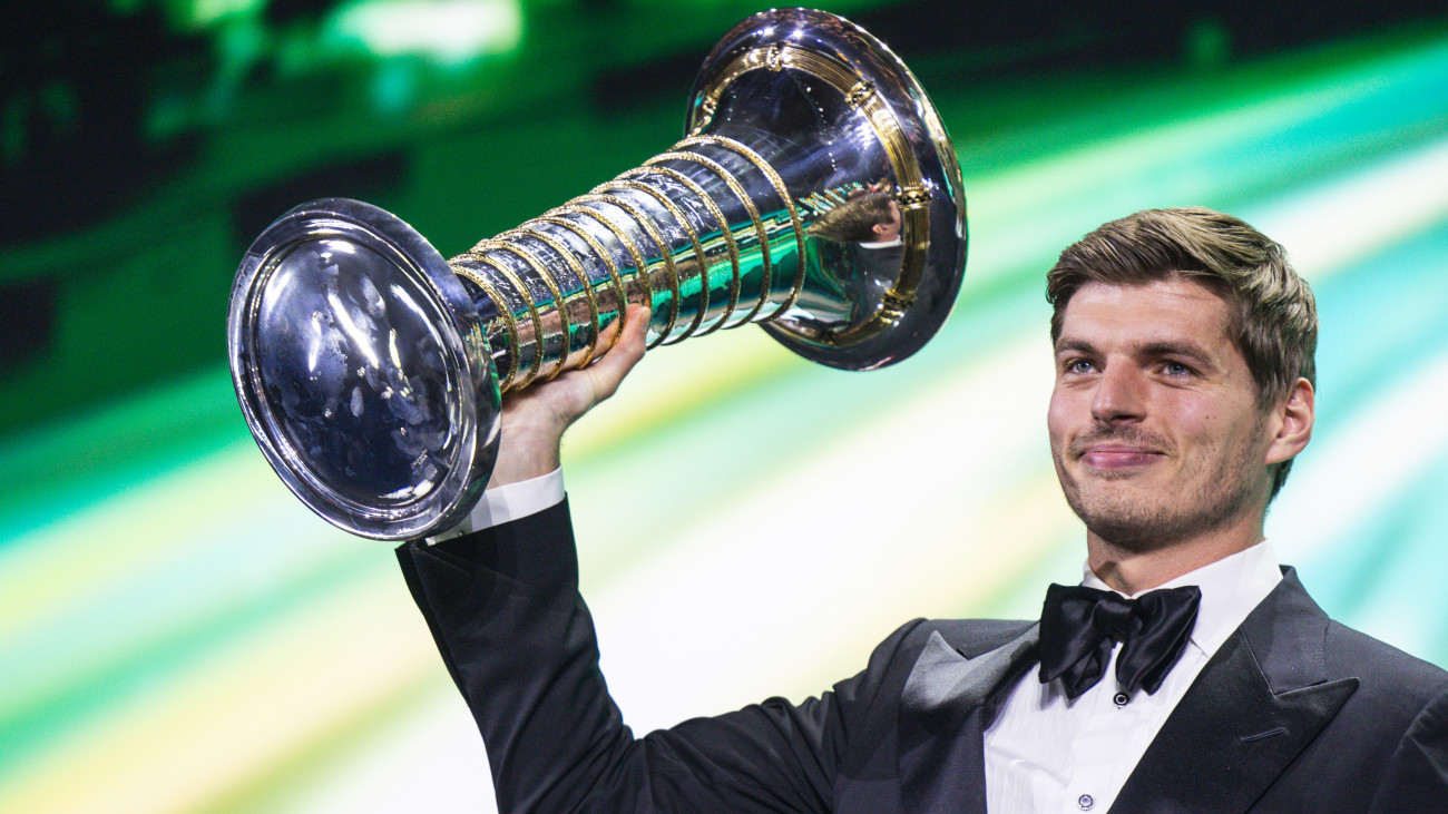 KIGALI, RWANDA - DECEMBER 13: In this handout provided by Federation Internationale de lAutomobile (FIA), F1 Champion Max Verstappen of Netherlands and Oracle Red Bull Racing receives the 1st position award during the FIA Awards 2024 on December 13, 2024 in Kigali, Rwanda.  (Photo by Handout/FIA/DPPI via Getty Images )