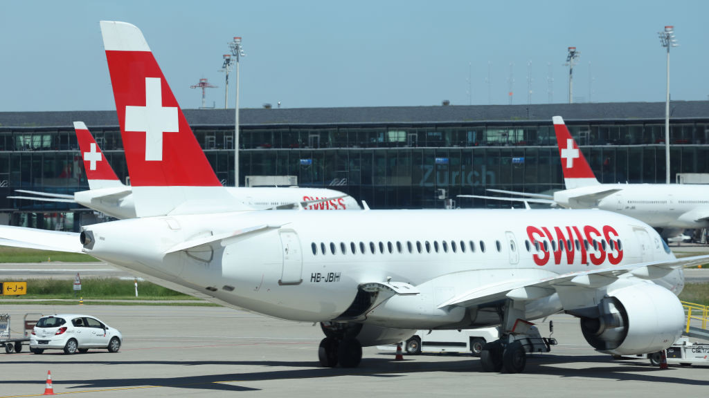 ZURICH, SWITZERLAND - JUNE 14: Passenger planes of Swiss airlines stand on the tarmac at Zurich Airport on June 14, 2021 in Zurich, Switzerland. The company recently announced it will be downsizing its fleet. (Photo by Sean Gallup/Getty Images)