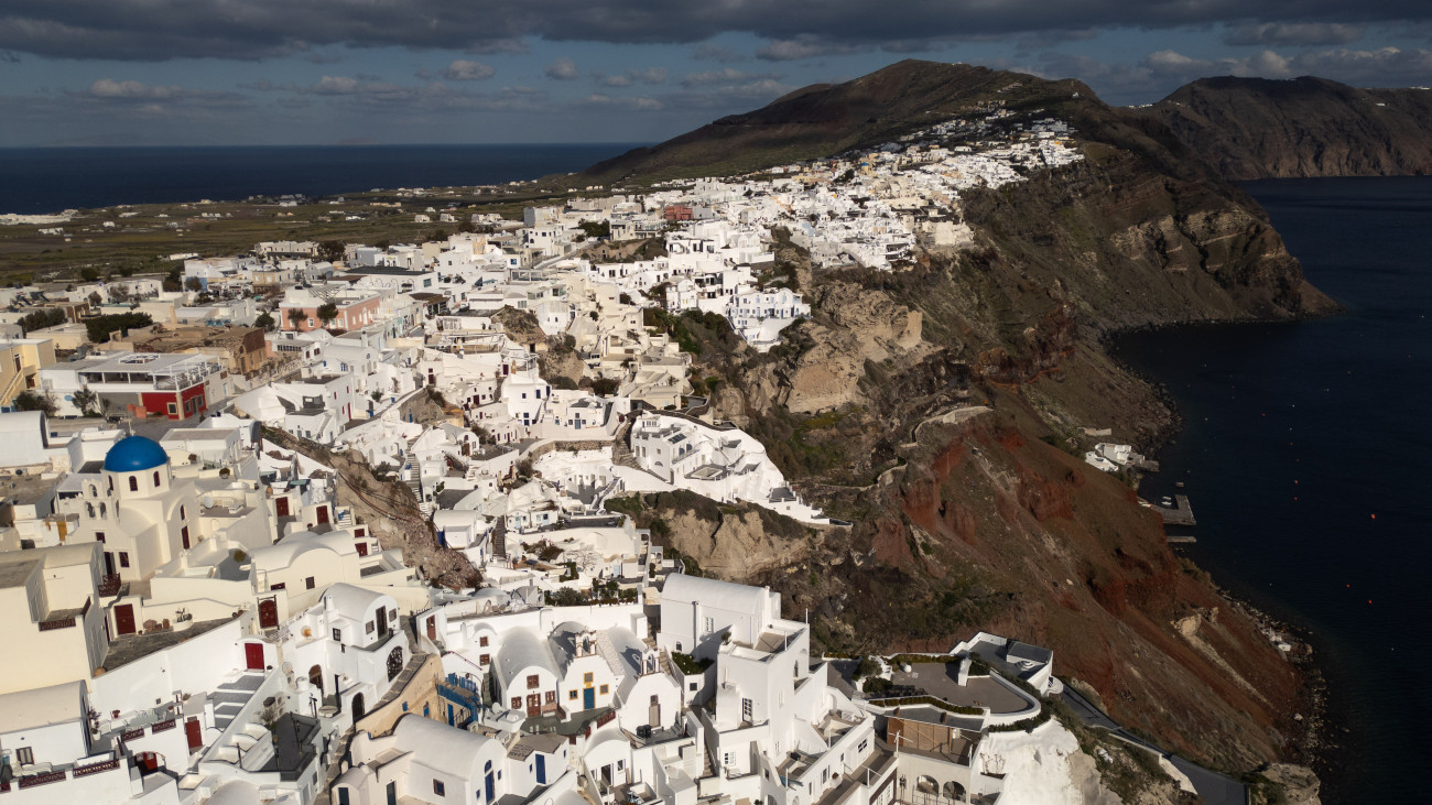 An aerial image shows the town of Oia built on a clifftop of the Santorini Caldera in Santorini, Greece, on February 11, 2025, during an earthquake swarm period. (Photo by Savvas Karmaniolas/NurPhoto via Getty Images)