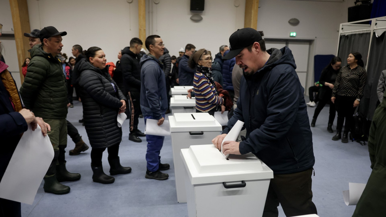 ILULISSAT, GREENLAND - MARCH 11: Voters cast their ballots at the polling station on March 11, 2025 in Ilulissat, Greenland. Greenland is holding a general election today to select the 31 members of its parliament, called the Inatsisartut. Greenland was due to hold elections next month, but Prime Minister Múte Egede called for an early vote amid the geopolitical tensions stoked by US President Donald Trumps vow to take control of the autonomous Danish territory.